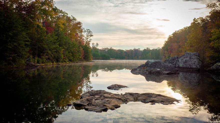 Misty Appalachian lake surrounded by autumn foliage